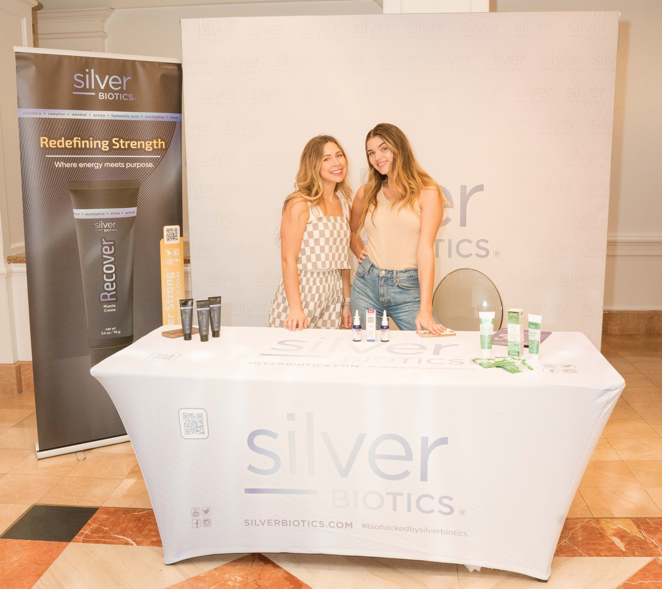 Exhibitors at a sponsor's product booth at the Healthspan Summit